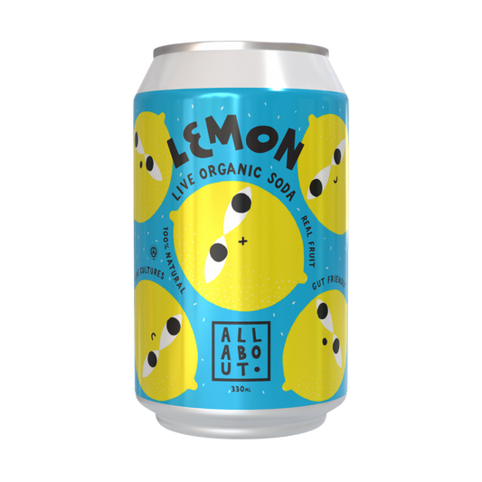 All About Kombucha 330ml can of lemon live organic soda featuring playful yellow lemon illustrations on a blue background, highlighting real fruit and gut-friendly benefits.